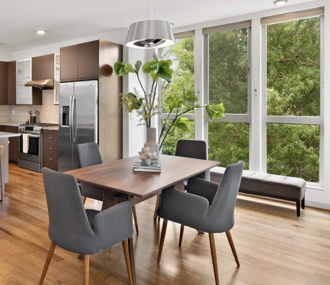 4 open dining space with floor to ceiling windows and wood floors